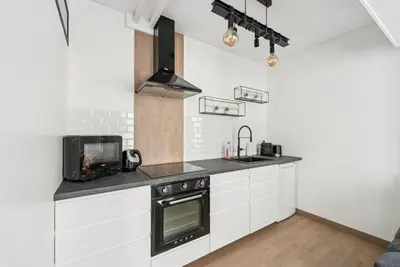 Cuisine ou kitchenette dans l'établissement Le Secret du 14e
