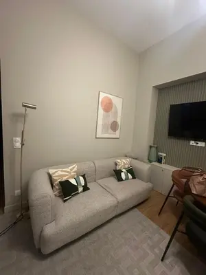 Coin salon dans l'établissement Chic 3-room air-conditioned apartment in the heart of Sentier