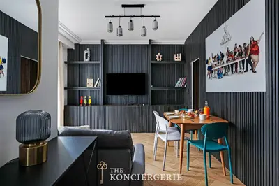 Télévision ou salle de divertissement dans l'établissement Appartement de prestige avec balcon - Paris 16e