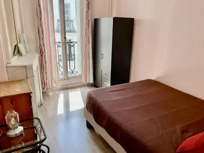 Un ou plusieurs lits dans un hébergement de l'établissement Apartment Haussmann Opera by Interhome