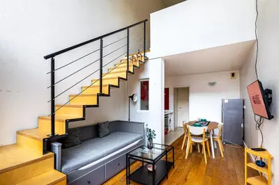 Coin salon dans l'établissement GuestReady - Comfortable stay in the 19th Arr.