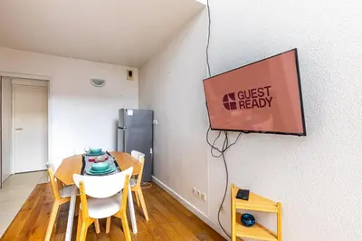 Télévision ou salle de divertissement dans l'établissement GuestReady - Comfortable stay in the 19th Arr.