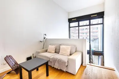 Coin salon dans l'établissement GuestReady - Comfortable stay in the 19th Arr.