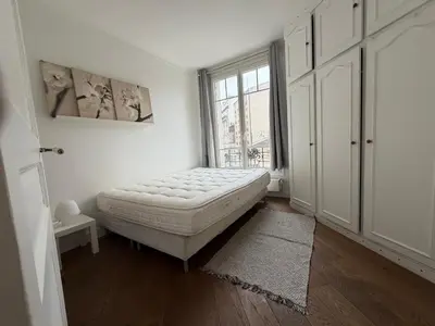 Un ou plusieurs lits dans un hébergement de l'établissement Le Marais République Paris