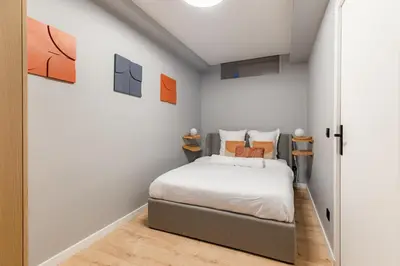 Un ou plusieurs lits dans un hébergement de l'établissement Chic 2-room apartment in the heart of Parisian luxury