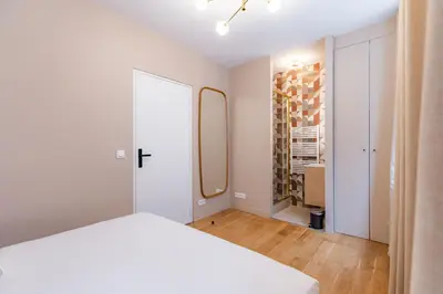 Un ou plusieurs lits dans un hébergement de l'établissement Exceptional triplex with 6 bedrooms & air conditioning
