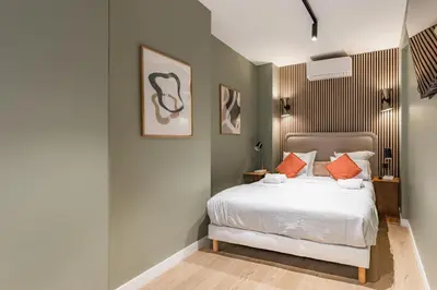 Un ou plusieurs lits dans un hébergement de l'établissement Chic 3-room air-conditioned apartment in the heart of the Marais