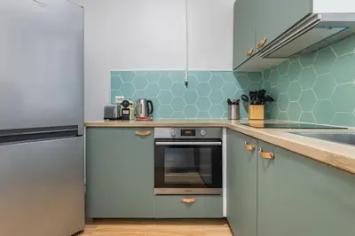 Cuisine ou kitchenette dans l'établissement Chic & Centra 2 Bedrooms in the Heart of Le Marais