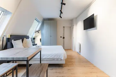 Un ou plusieurs lits dans un hébergement de l'établissement Cozy & Fully Equipped Studio in the Heart of Paris