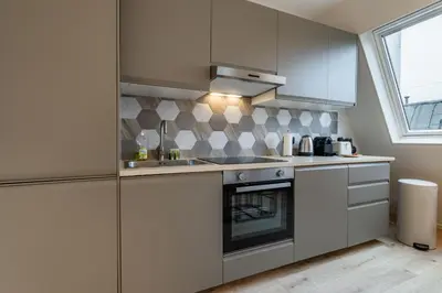 Cuisine ou kitchenette dans l'établissement Cozy & Fully Equipped Studio in the Heart of Paris