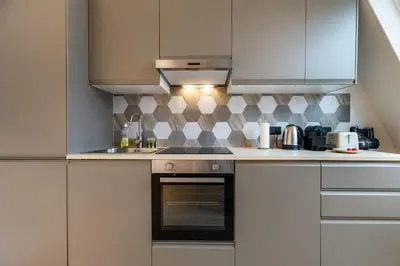 Cuisine ou kitchenette dans l'établissement Cozy & Fully Equipped Studio in the Heart of Paris