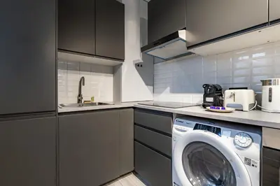 Cuisine ou kitchenette dans l'établissement Studio Lumineux au Cœur de Paris Centre