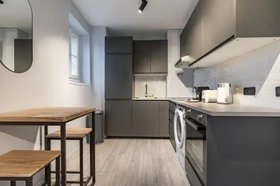 Cuisine ou kitchenette dans l'établissement Studio Lumineux au Cœur de Paris Centre