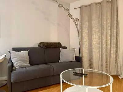 Coin salon dans l'établissement Le charme parisien au cœur de Montmartre