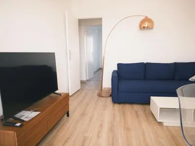 Télévision ou salle de divertissement dans l'établissement Comfortable 64 m2 Apt near Stade de France Self Check in