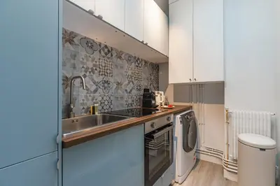 Cuisine ou kitchenette dans l'établissement Escapade Parisienne au Cœur d'un Quartier Mythique