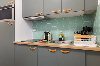 Cuisine ou kitchenette dans l'établissement Cosy & Central Votre Cocon au Cœur de Paris