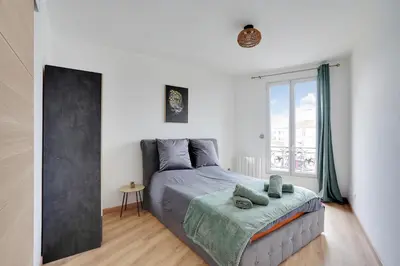 Un ou plusieurs lits dans un hébergement de l'établissement Appartement Suite 33