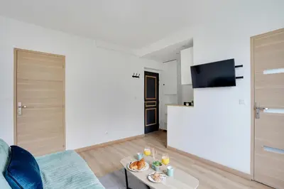 Télévision ou salle de divertissement dans l'établissement Appartement Suite 33