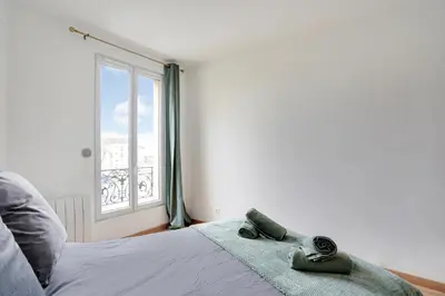 Un ou plusieurs lits dans un hébergement de l'établissement Appartement Suite 33