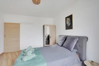 Un ou plusieurs lits dans un hébergement de l'établissement Appartement Suite 33