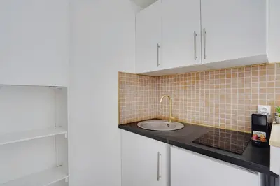 Cuisine ou kitchenette dans l'établissement Appartement Suite 33