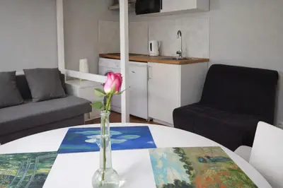 Coin salon dans l'établissement Bright Guest Suite by Place de la Bastille Marais