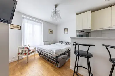 Un ou plusieurs lits dans un hébergement de l'établissement Bright & Cozy Flat near Eiffel Tower