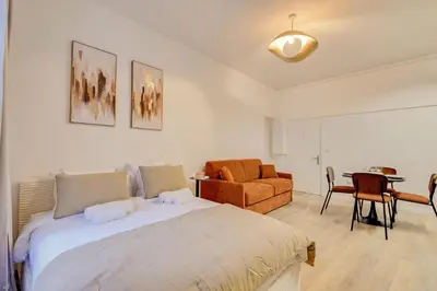 Un ou plusieurs lits dans un hébergement de l'établissement Studio confortable pour 4 au cœur de Paris