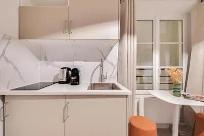Cuisine ou kitchenette dans l'établissement Studio confortable au cœur de Paris