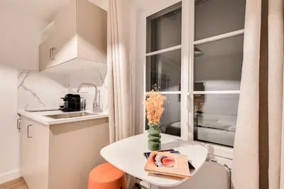 Cuisine ou kitchenette dans l'établissement Studio confortable au cœur de Paris