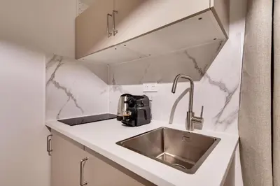 Cuisine ou kitchenette dans l'établissement Studio confortable au cœur de Paris