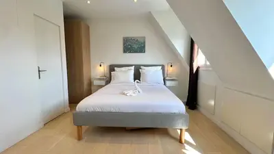 Un ou plusieurs lits dans un hébergement de l'établissement Air conditioning, calm & comfort in the heart of Paris Marais