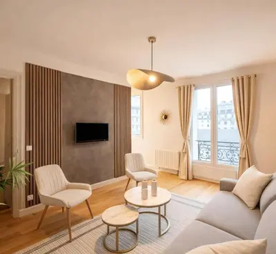 Télévision ou salle de divertissement dans l'établissement Family flat - Montparnasse