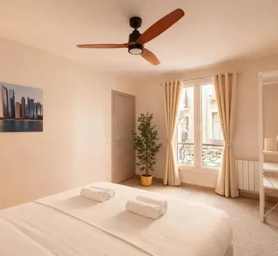 Un ou plusieurs lits dans un hébergement de l'établissement Family flat - Montparnasse