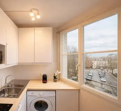 Cuisine ou kitchenette dans l'établissement Family flat - Montparnasse