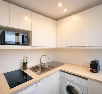 Cuisine ou kitchenette dans l'établissement Family flat - Montparnasse