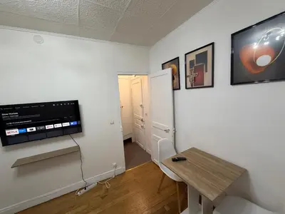 Télévision ou salle de divertissement dans l'établissement Chambre de luxe