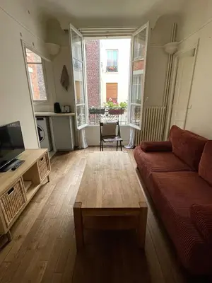 Télévision ou salle de divertissement dans l'établissement Appartement 2 pièces Saint-Ouen