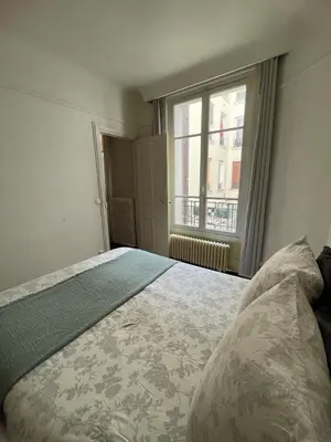 Un ou plusieurs lits dans un hébergement de l'établissement Appartement 2 pièces Saint-Ouen