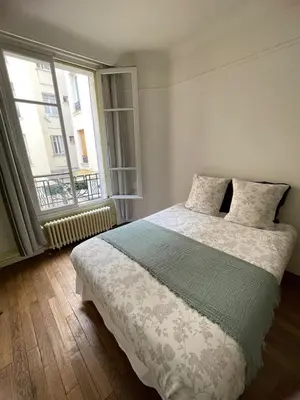 Un ou plusieurs lits dans un hébergement de l'établissement Appartement 2 pièces Saint-Ouen