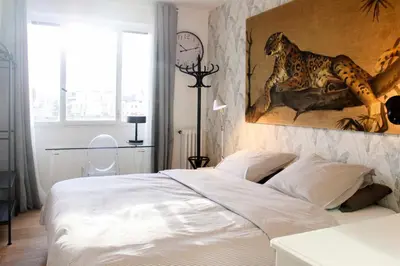 Un ou plusieurs lits dans un hébergement de l'établissement Appartement lumineux à Boulogne-Billancourt