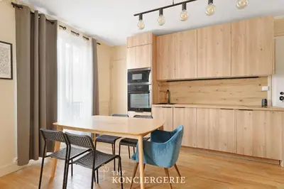 Cuisine ou kitchenette dans l'établissement Elegant appartement moderne au coeur du Paris historique