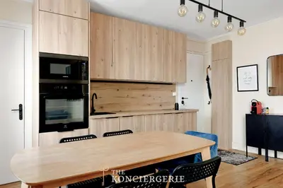 Cuisine ou kitchenette dans l'établissement Elegant appartement moderne au coeur du Paris historique