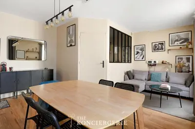 Coin salon dans l'établissement Elegant appartement moderne au coeur du Paris historique