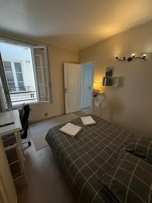Un ou plusieurs lits dans un hébergement de l'établissement Comfortable Flat in Levallois - Close to Paris