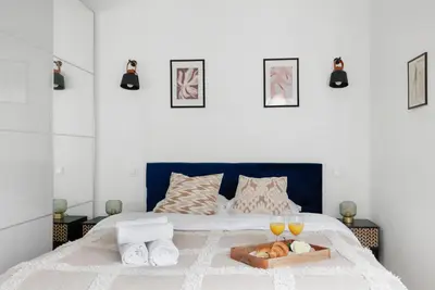 Un ou plusieurs lits dans un hébergement de l'établissement Serenty - 2BR - Arc de Triomphe & Champs-Élysées