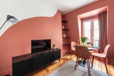 Télévision ou salle de divertissement dans l'établissement Central Apartment - Near the Champs-Élysées