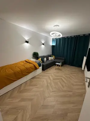 Coin salon dans l'établissement PARIS-MONTROUGE Magnifique Appartement 2 pièce de 56m2 - très cosy pour 1 à 6 personnes refait à neuf - ENTIRE APARTMENT LUXURIOUS AND WARM - Montrouge Paris 14ème - Proche Aéroport Orly & Parc Expositions Porte de Versailles FREE WIFI GRATUIT