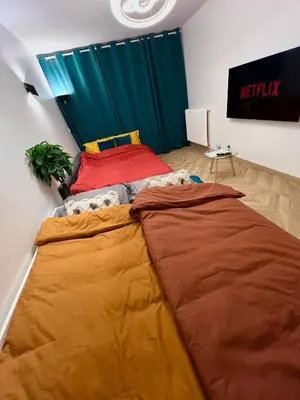 Un ou plusieurs lits dans un hébergement de l'établissement PARIS-MONTROUGE Magnifique Appartement 2 pièce de 56m2 - très cosy pour 1 à 6 personnes refait à neuf - ENTIRE APARTMENT LUXURIOUS AND WARM - Montrouge Paris 14ème - Proche Aéroport Orly & Parc Expositions Porte de Versailles FREE WIFI GRATUIT